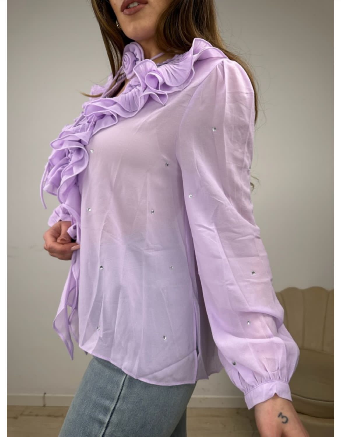 Violet ruffle top with rose detail